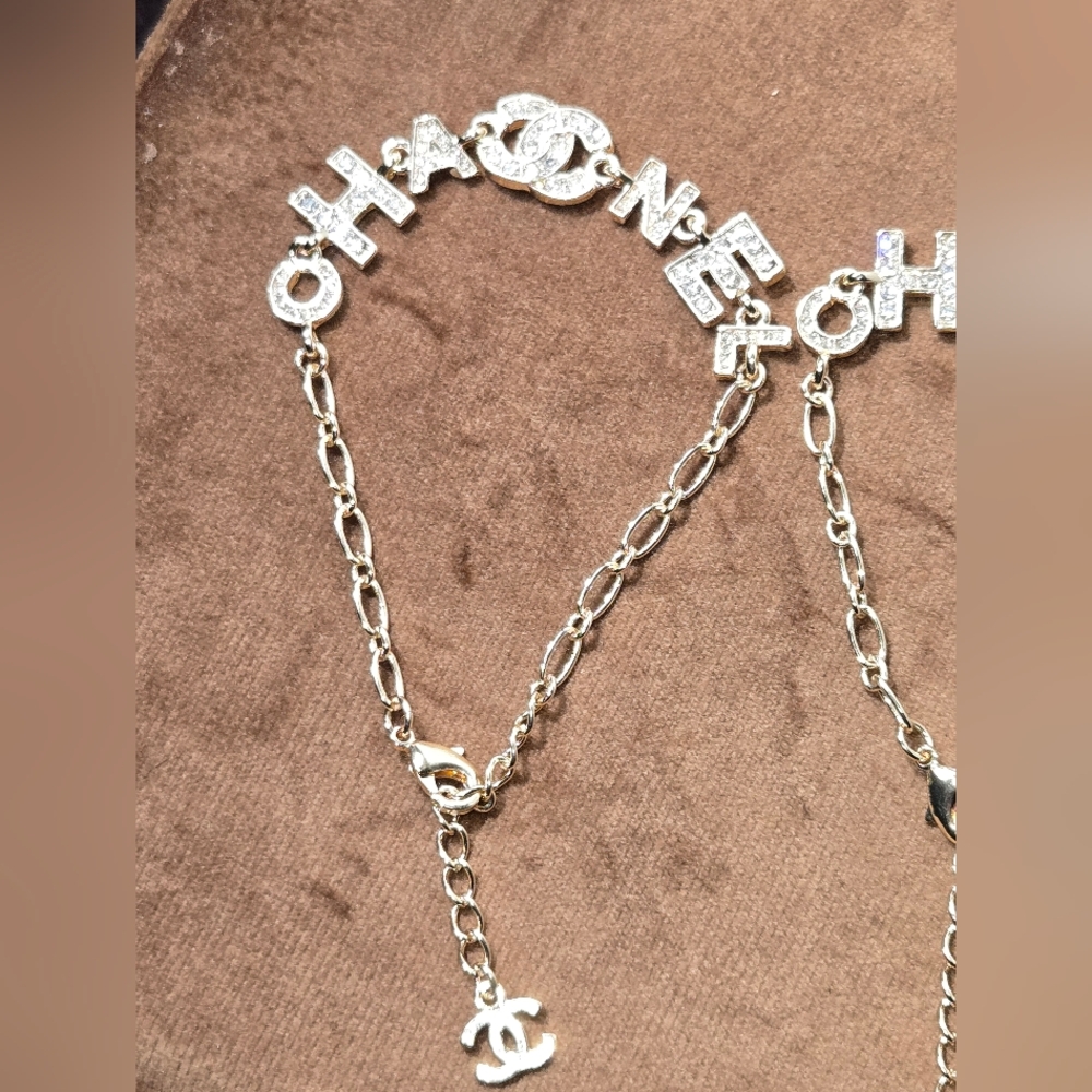 Gold Tone Logo Bracelet With Rocks - Picture 10 of 14